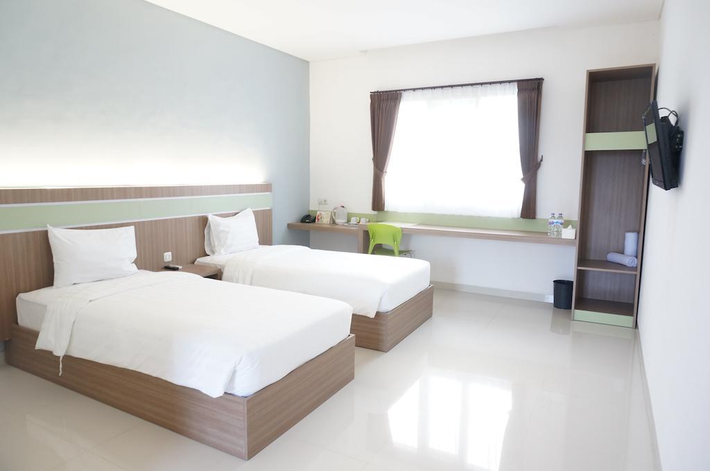 Rumah Cassa Guest House Surabaya Rum bild